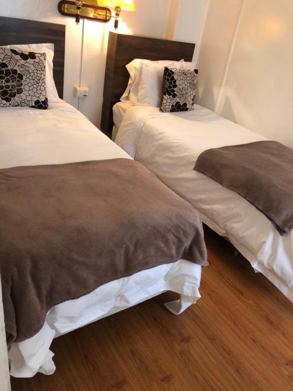 Postel nebo postele na pokoji v ubytování Matic Apartments