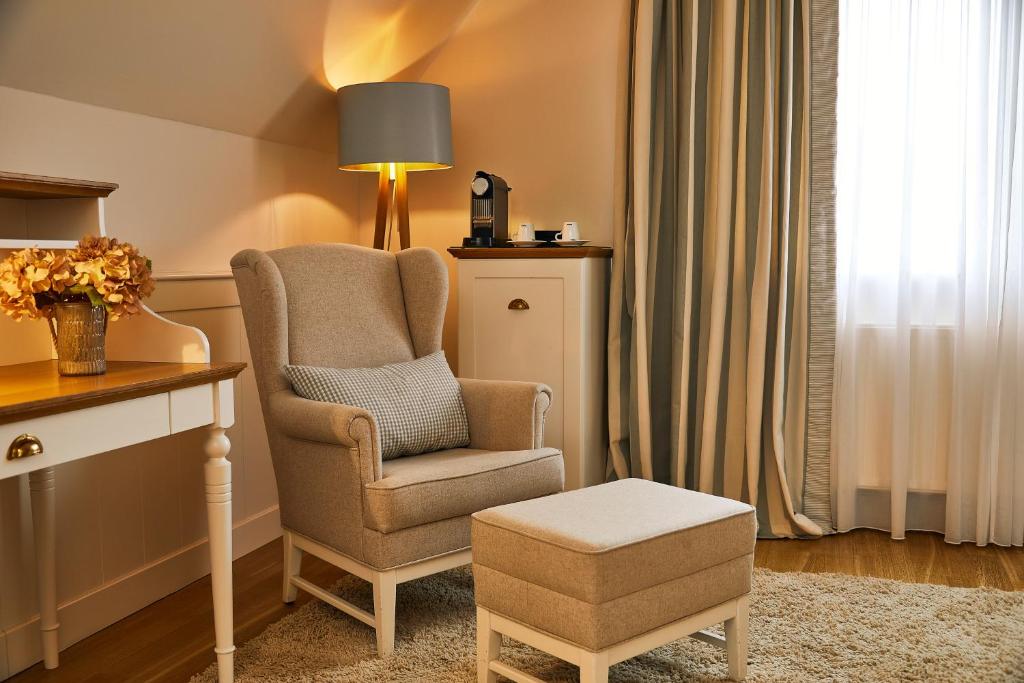 Posezení v ubytování Fuchsbau Romantik Hotel & SPA Restaurant & FOX Bar
