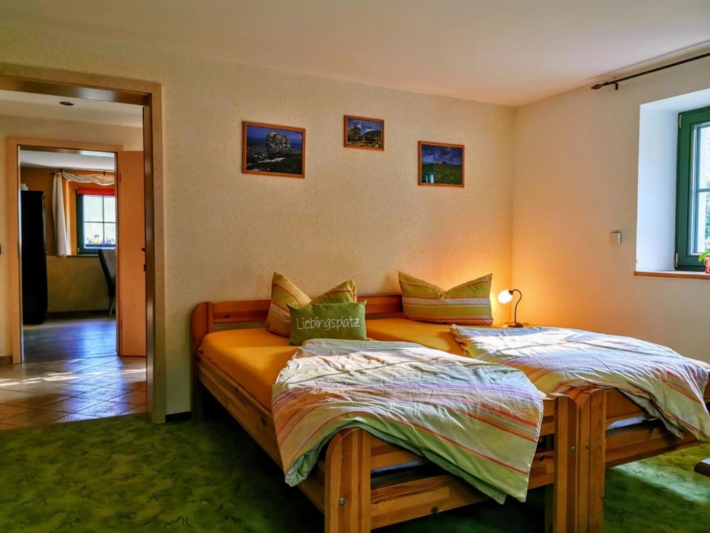 Postel nebo postele na pokoji v ubytování Ferienwohnung Hegemühle