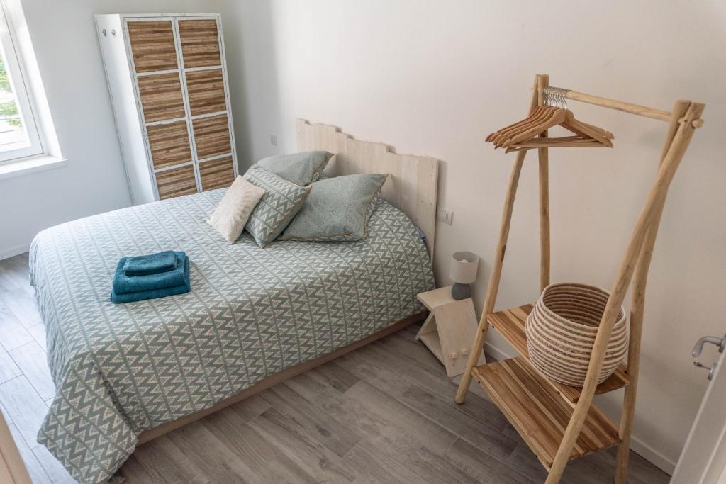 A bed or beds in a room at Casa Ghisa
