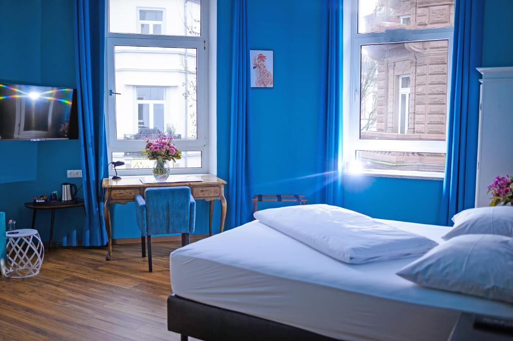 Postel nebo postele na pokoji v ubytování SmartHotel Mystique Self check-in
