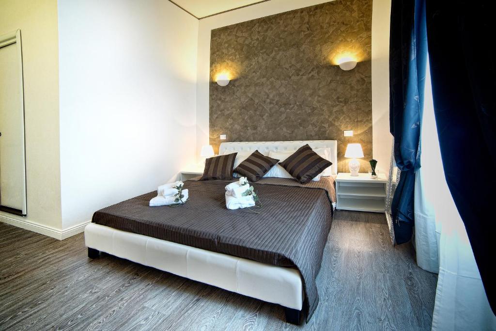 Posteľ alebo postele v izbe v ubytovaní Rome Key Home