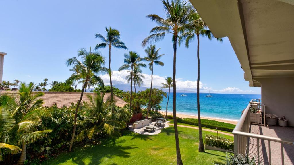 a view of the ocean from the balcony of a resort at Maui Westside Properties - The Whaler 359 in Kaanapali