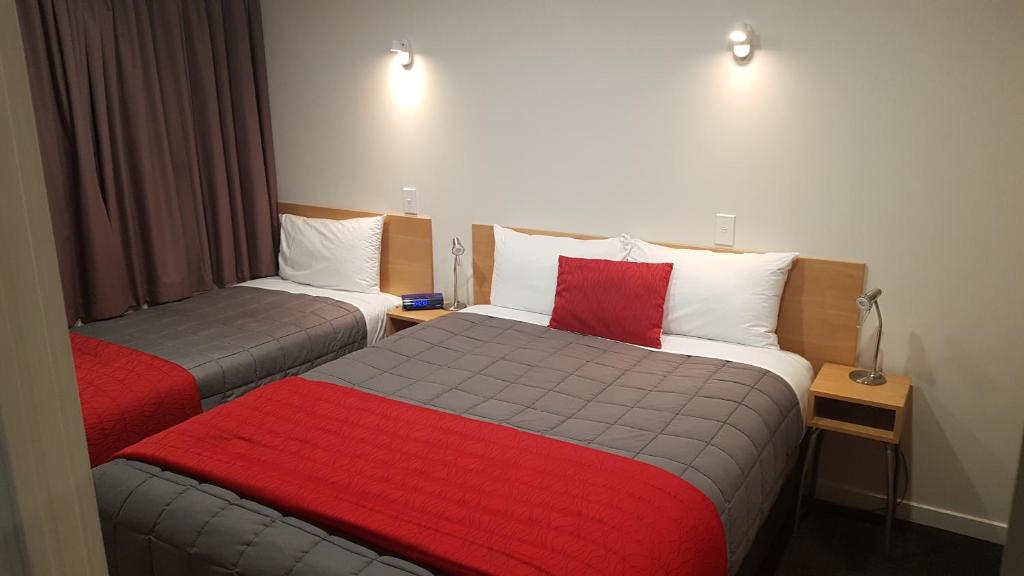 Postel nebo postele na pokoji v ubytování Taylors Motel