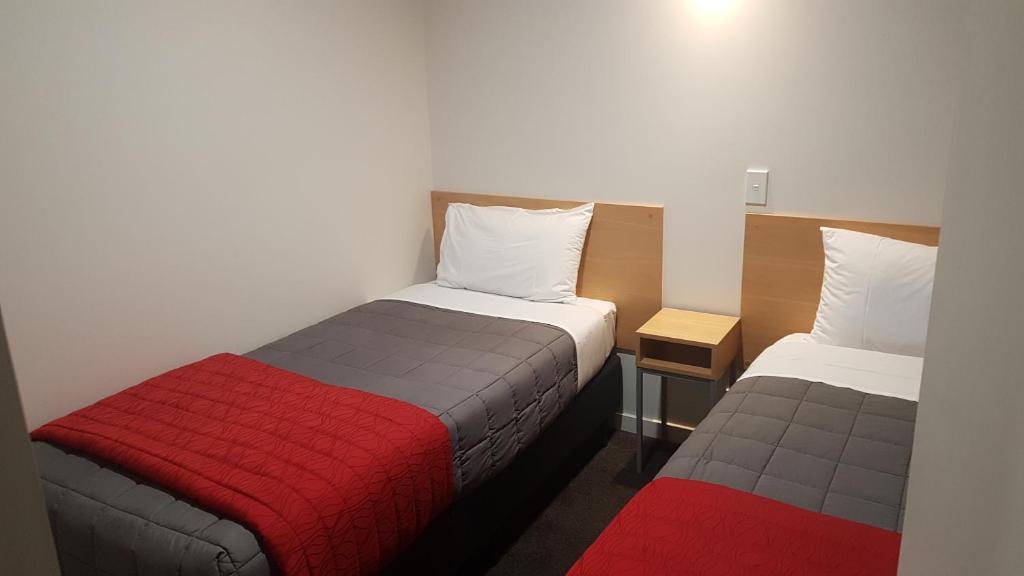 Postel nebo postele na pokoji v ubytování Taylors Motel