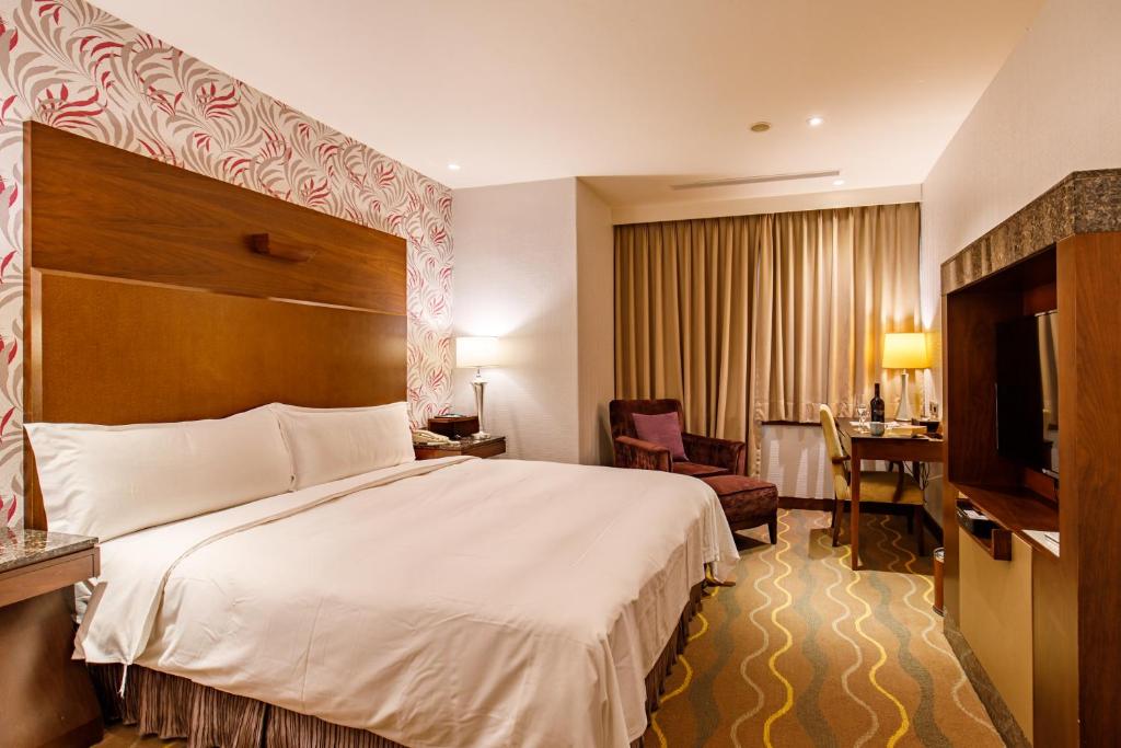 Postel nebo postele na pokoji v ubytování Hotel HD Palace