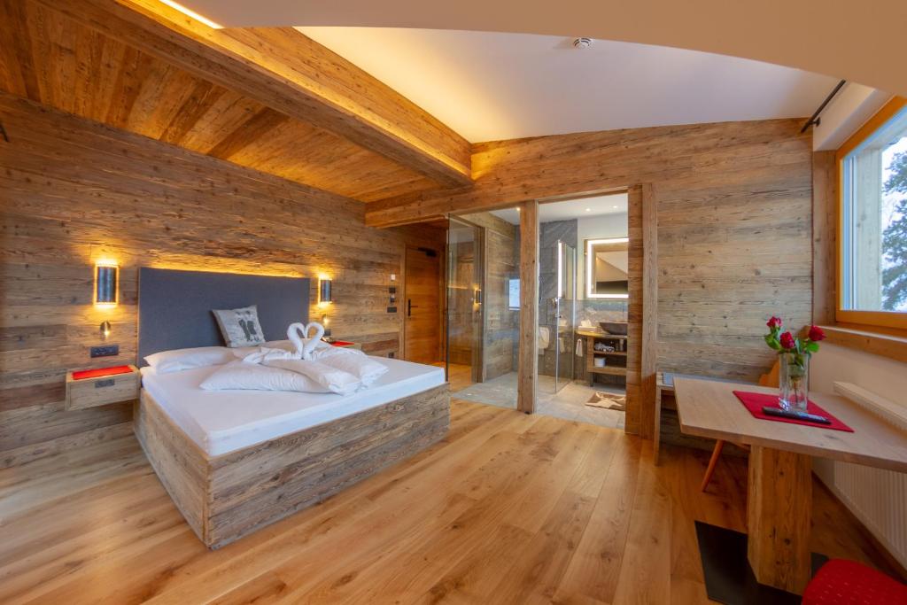 Voodi või voodid majutusasutuse Hotel Rosengarten toas