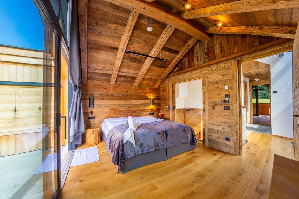 Voodi või voodid majutusasutuse Hotel Rosengarten toas