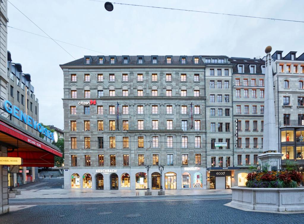 a large building in the middle of a street at citizenM Geneva in Geneva