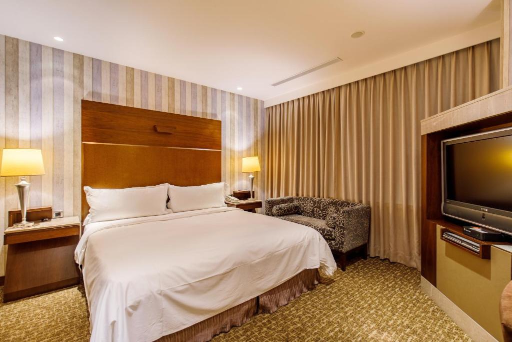 TV a/nebo společenská místnost v ubytování Hotel HD Palace