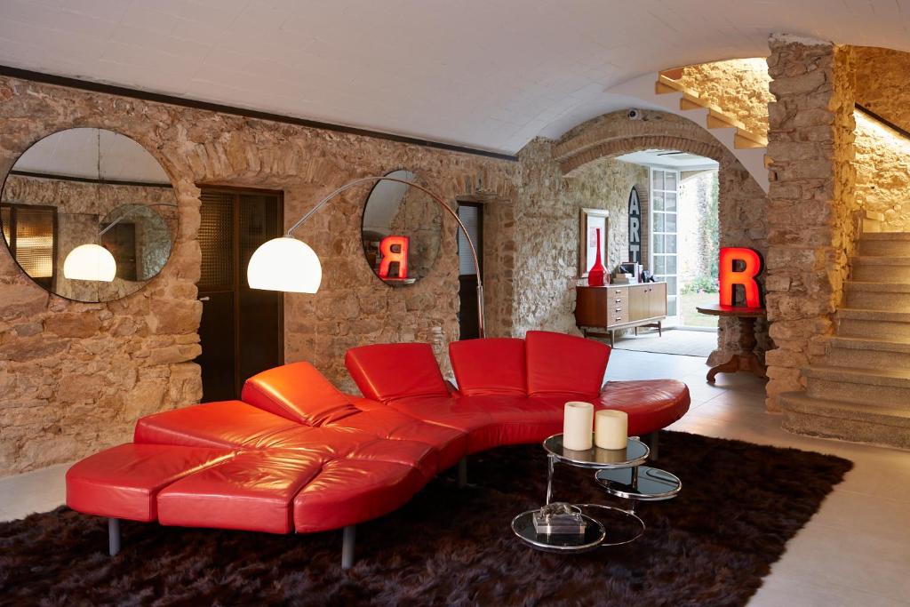 Posezení v ubytování Llimona Suites - Adults Only