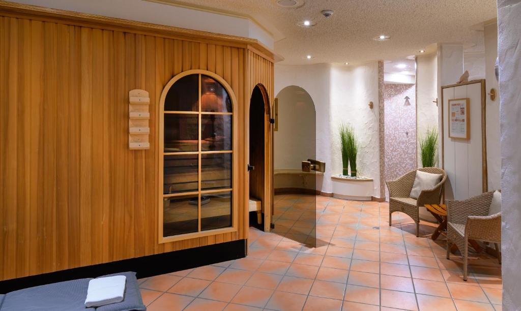 Posezení v ubytování Hotel am Wasserfall