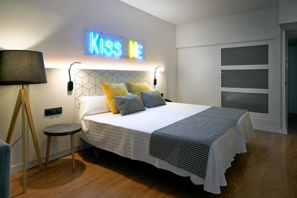 Postel nebo postele na pokoji v ubytování Flamboyan Caribe Hotel & Spa