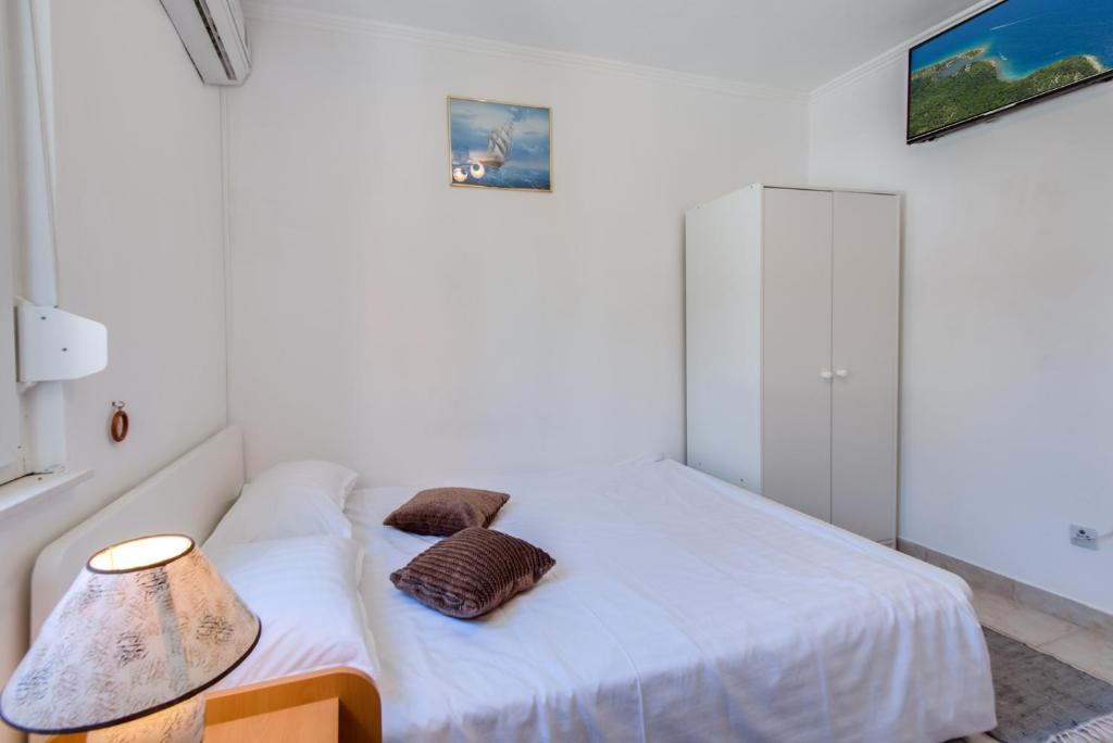 Postel nebo postele na pokoji v ubytování House Goran