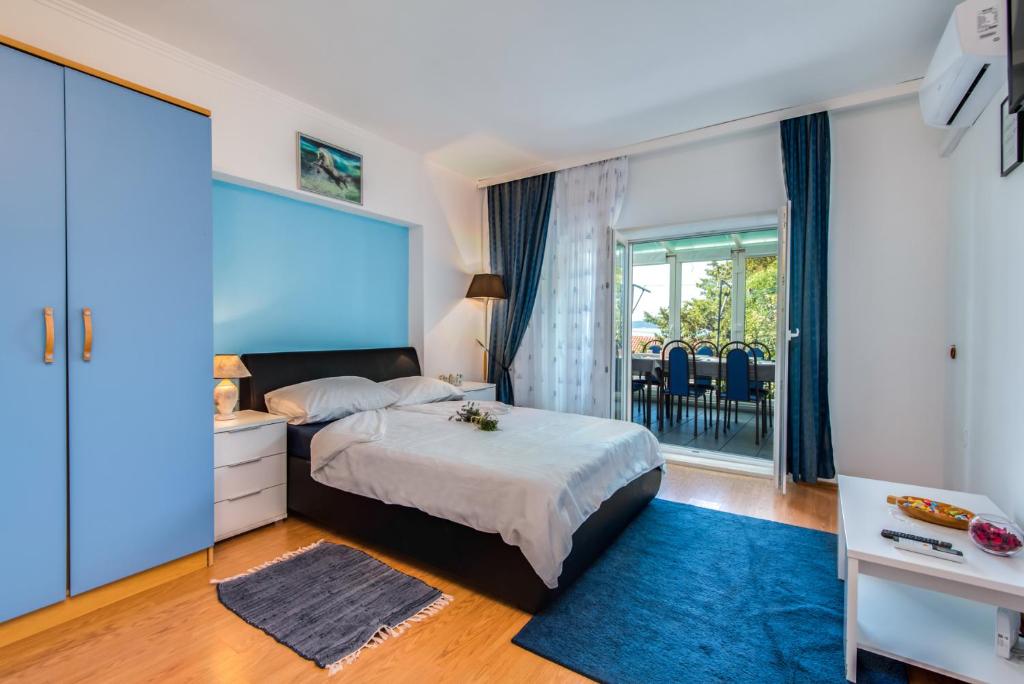 Postel nebo postele na pokoji v ubytování House Goran