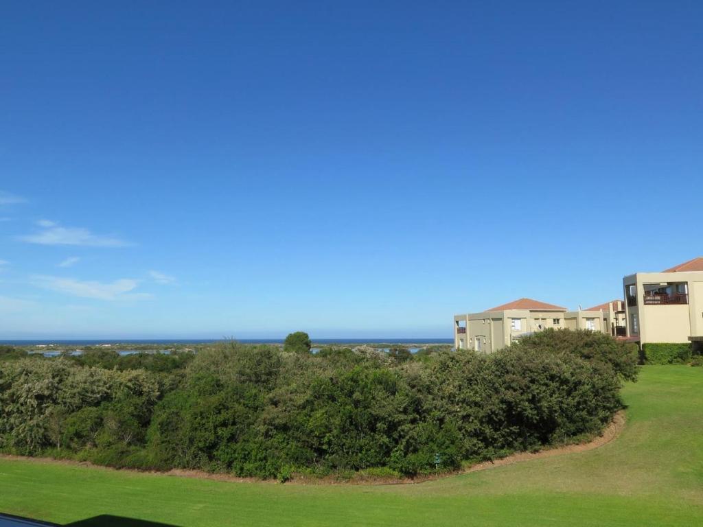 a view of the ocean from a building at Goose Valley Retreat with Sea Views in Plettenberg Bay