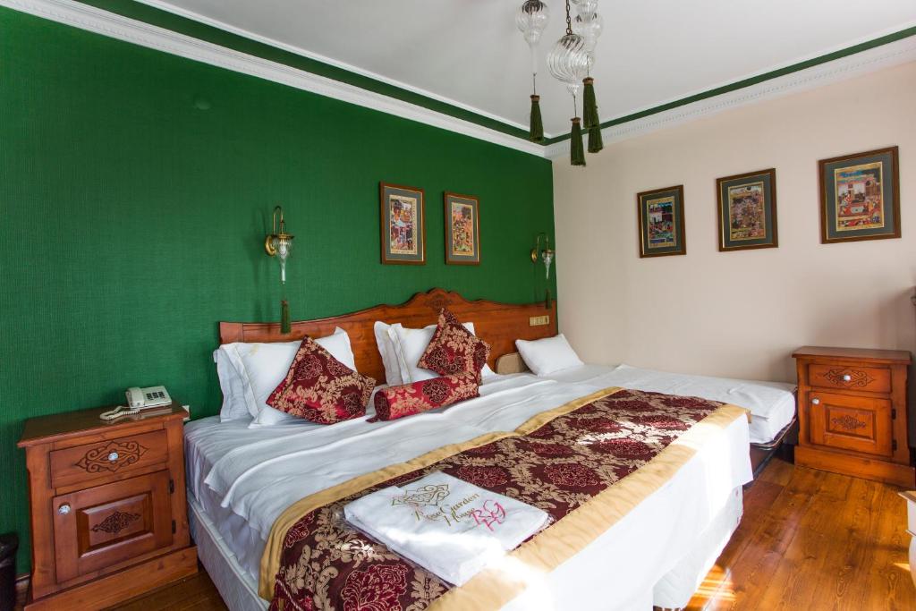 Cama o camas de una habitación en Garden House Hotel - Special Class