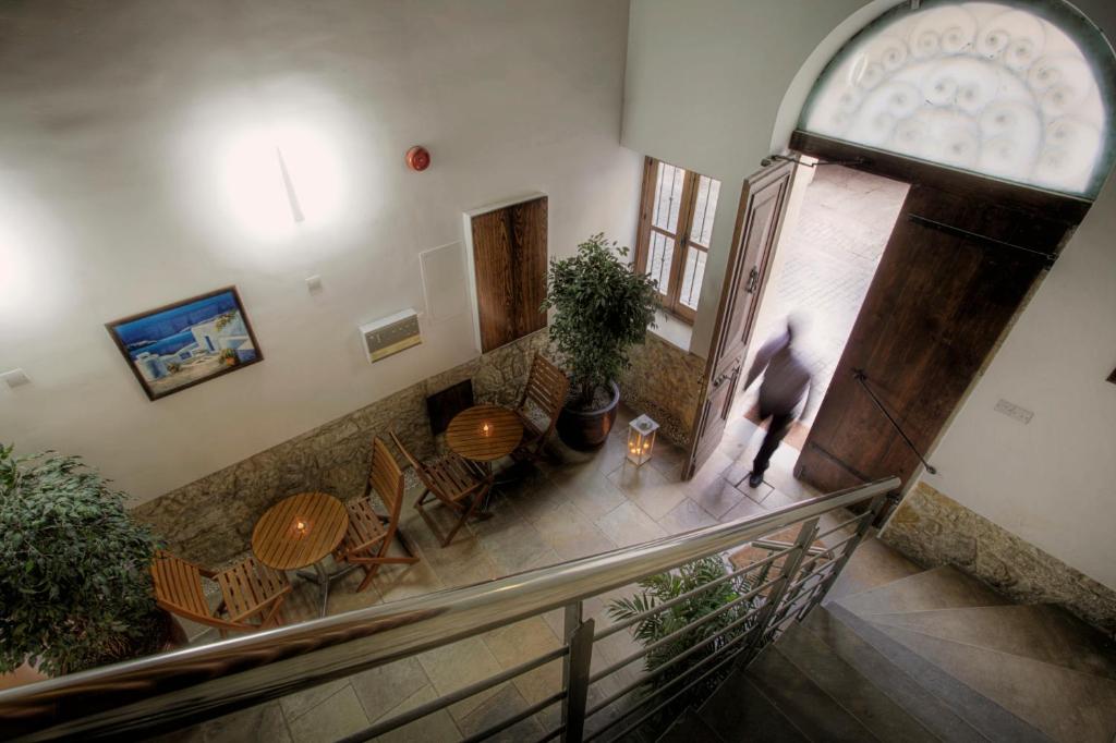 TV a/nebo společenská místnost v ubytování Alkisti City Hotel