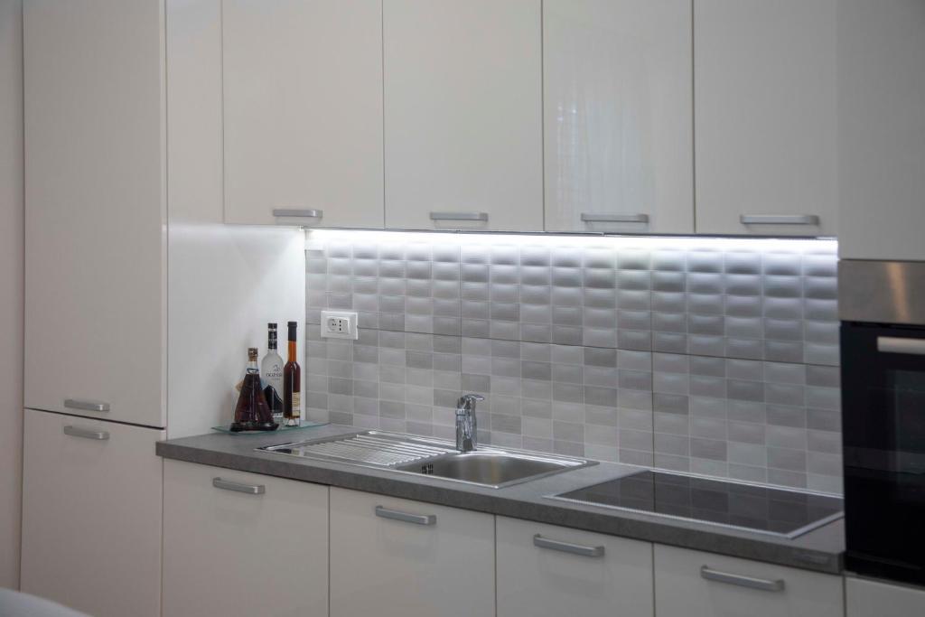 Kuchyň nebo kuchyňský kout v ubytování Apartment Fragola