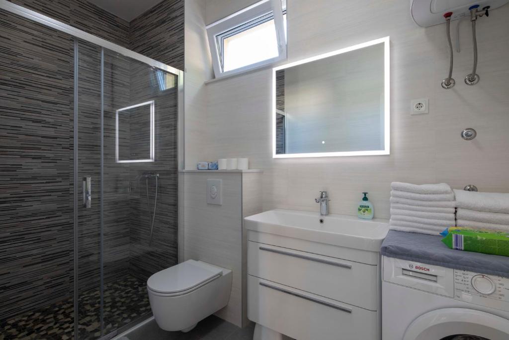 Koupelna v ubytování Apartment Fragola