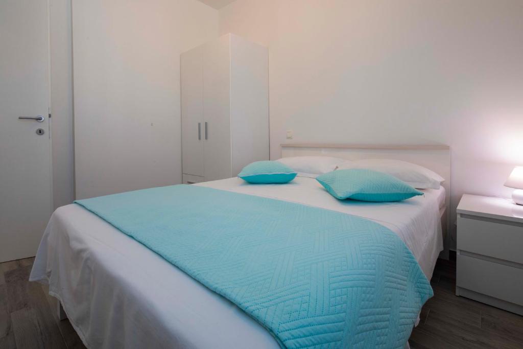 Postel nebo postele na pokoji v ubytování Apartment Fragola