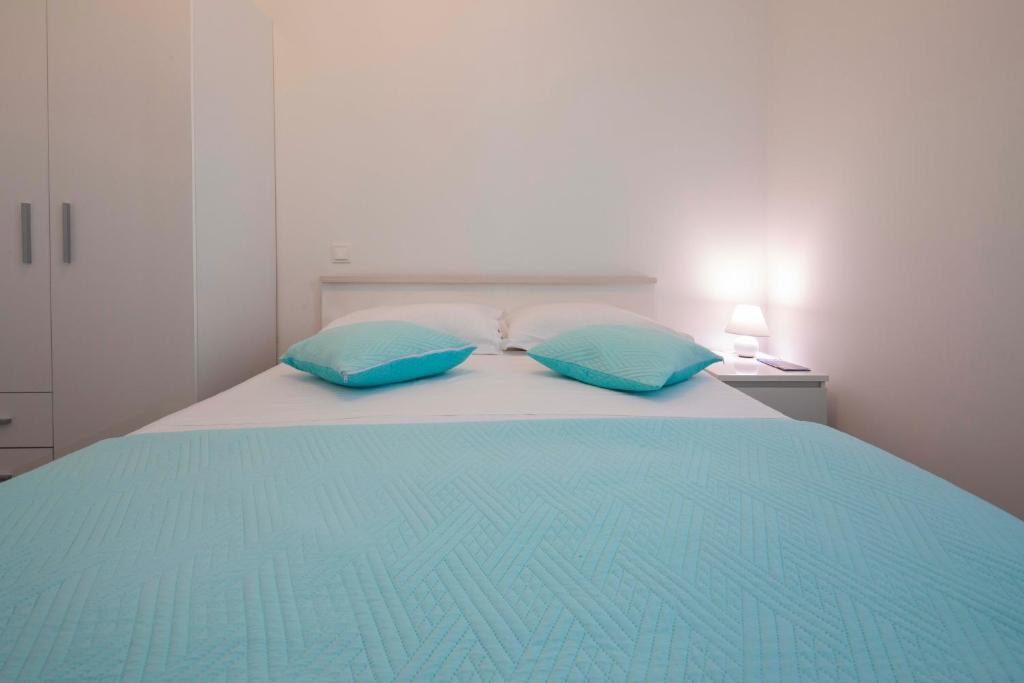 Postel nebo postele na pokoji v ubytování Apartment Fragola