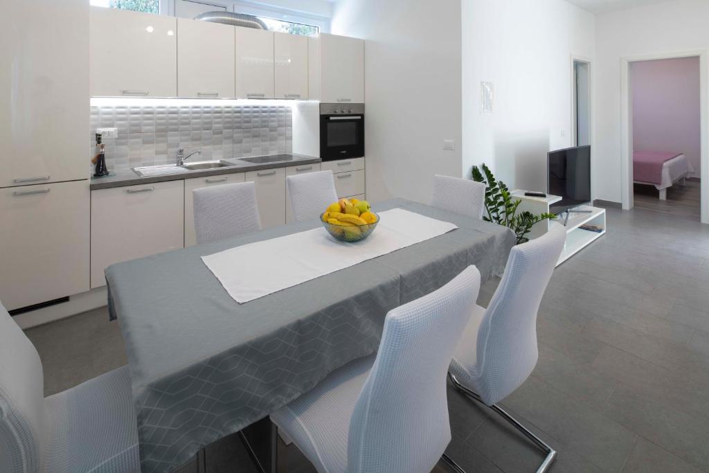 Kuchyň nebo kuchyňský kout v ubytování Apartment Fragola