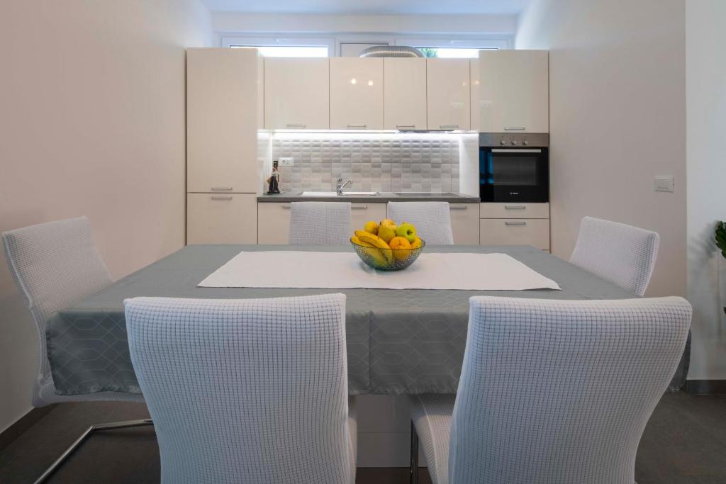 Kuchyň nebo kuchyňský kout v ubytování Apartment Fragola