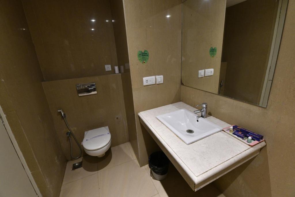 Koupelna v ubytování PLA Krishna Inn