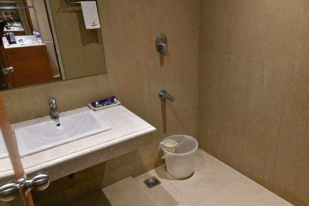 Koupelna v ubytování PLA Krishna Inn