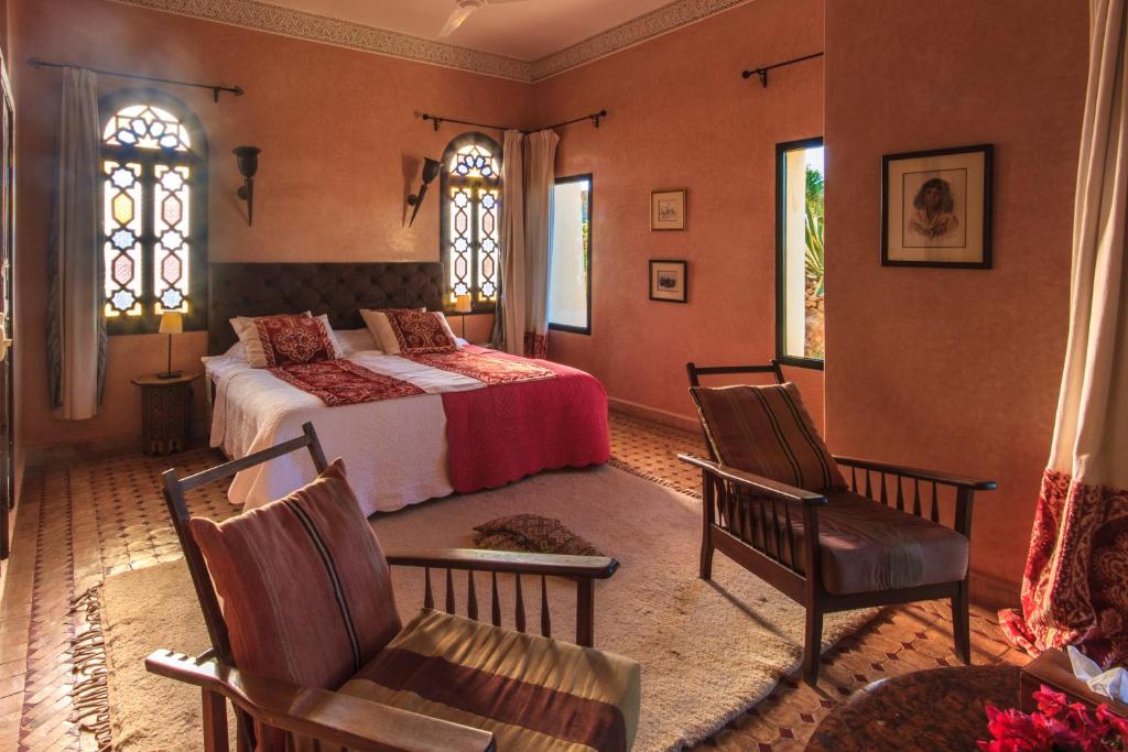 Una cama o camas en una habitación de Kasbah Tabelkoukt