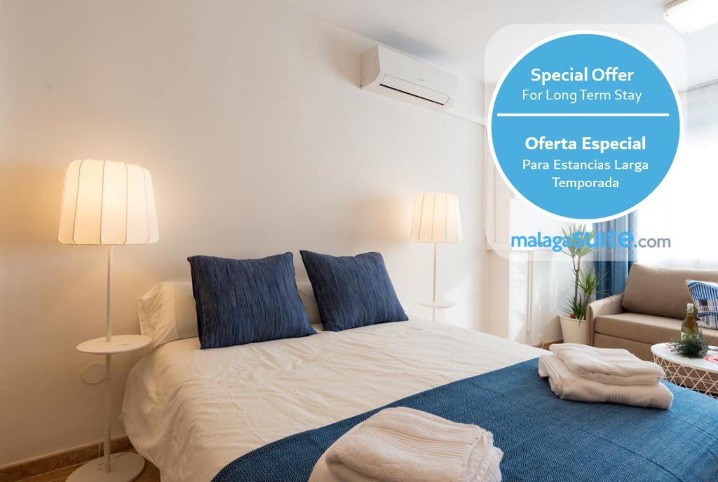 Cama o camas de una habitación en MalagaSuite Studio Beach
