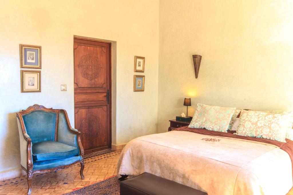 Una cama o camas en una habitación de Kasbah Tabelkoukt