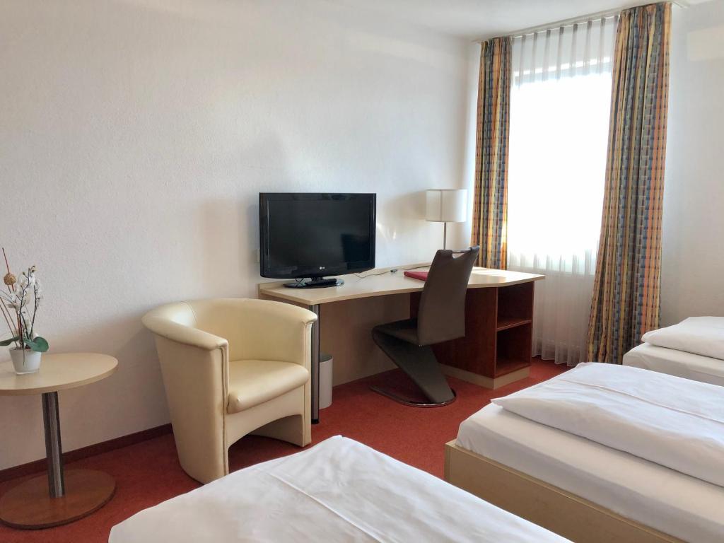 Postel nebo postele na pokoji v ubytování Hotel Günter