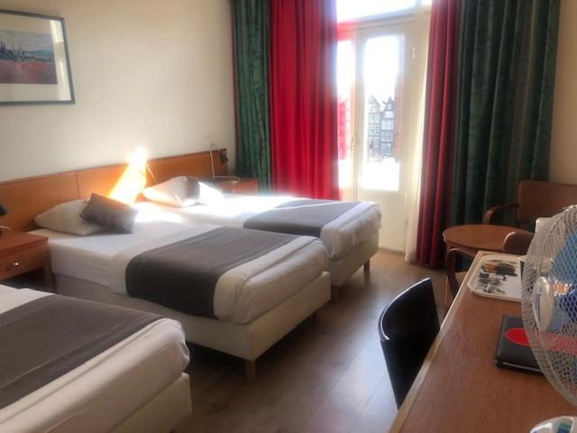 Postel nebo postele na pokoji v ubytování Delta Hotel City Center