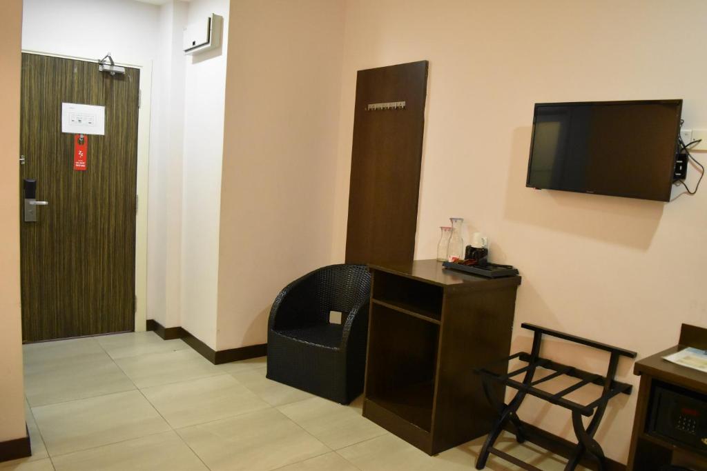 TV a/nebo společenská místnost v ubytování Sunrise Hotel