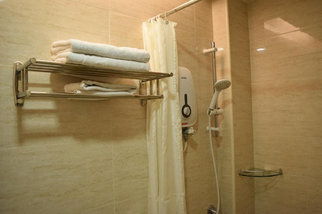 Koupelna v ubytování Sunrise Hotel