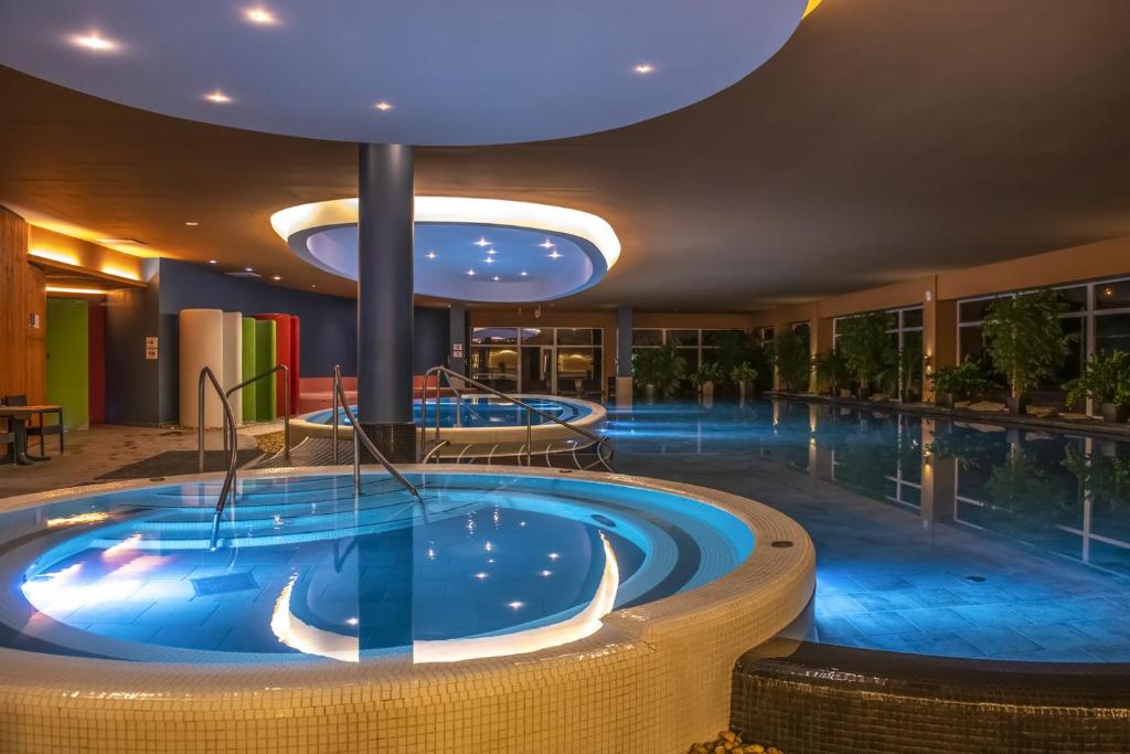 The swimming pool at or close to Hunguest Szeged - ex Forrás