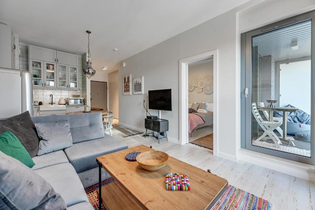 Televízia a/alebo spoločenská miestnosť v ubytovaní Granaria Comfort Apartments