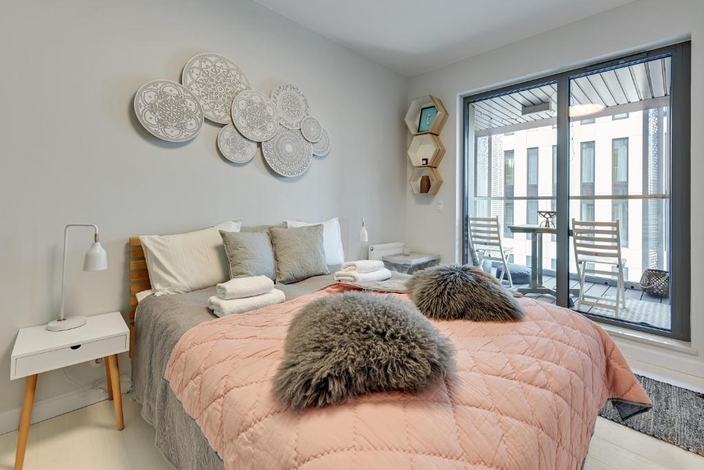 Posteľ alebo postele v izbe v ubytovaní Granaria Comfort Apartments