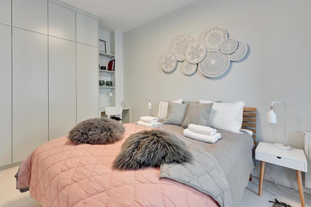 Posteľ alebo postele v izbe v ubytovaní Granaria Comfort Apartments