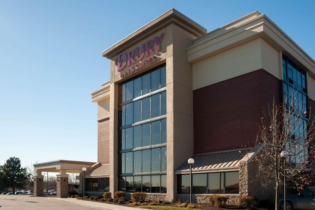 a building with a sign on the front of it at Drury Inn & Suites Kansas City Airport in Kansas City