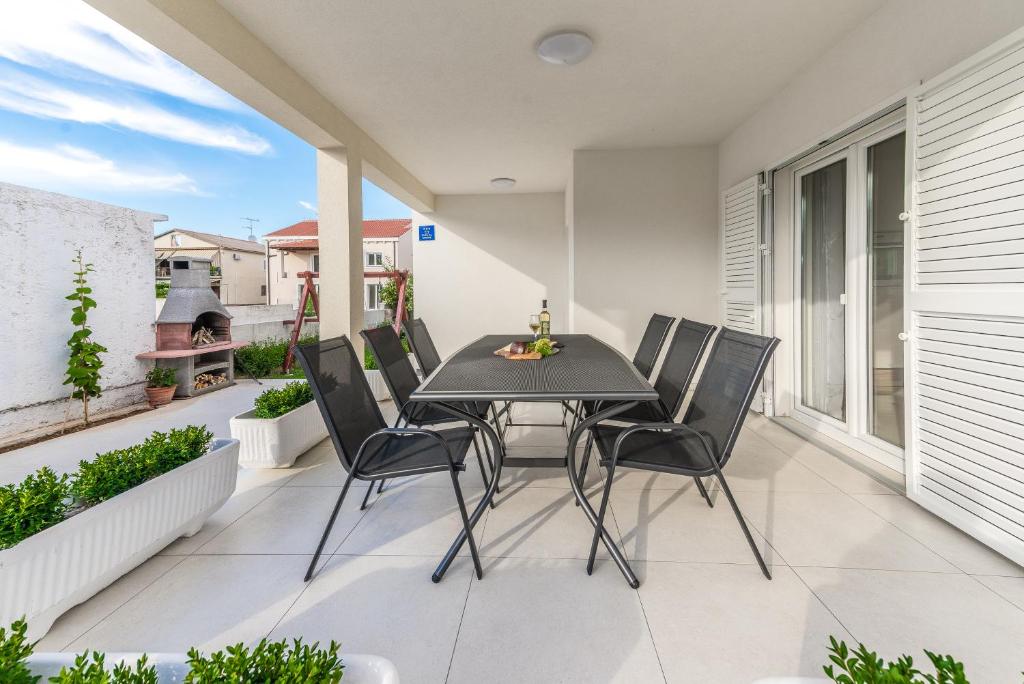 Balkón alebo terasa v ubytovaní Holiday Home Bajlo apartment with three bedrooms