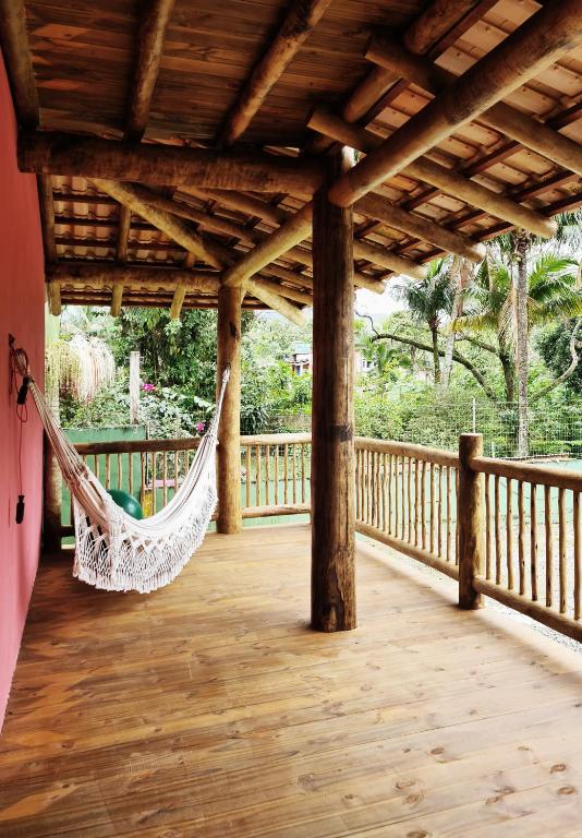Uma varanda ou terraço em Pousada Tubes Maresias