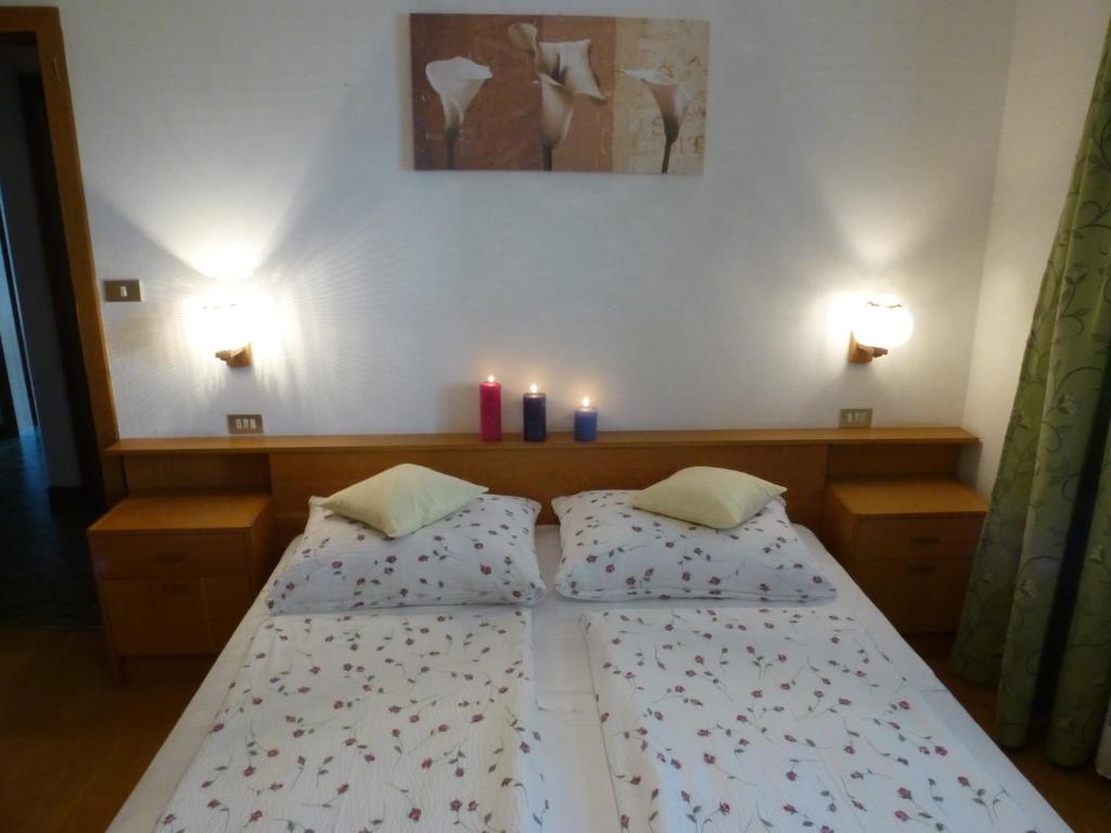 Postel nebo postele na pokoji v ubytování Apartment Weissenegger