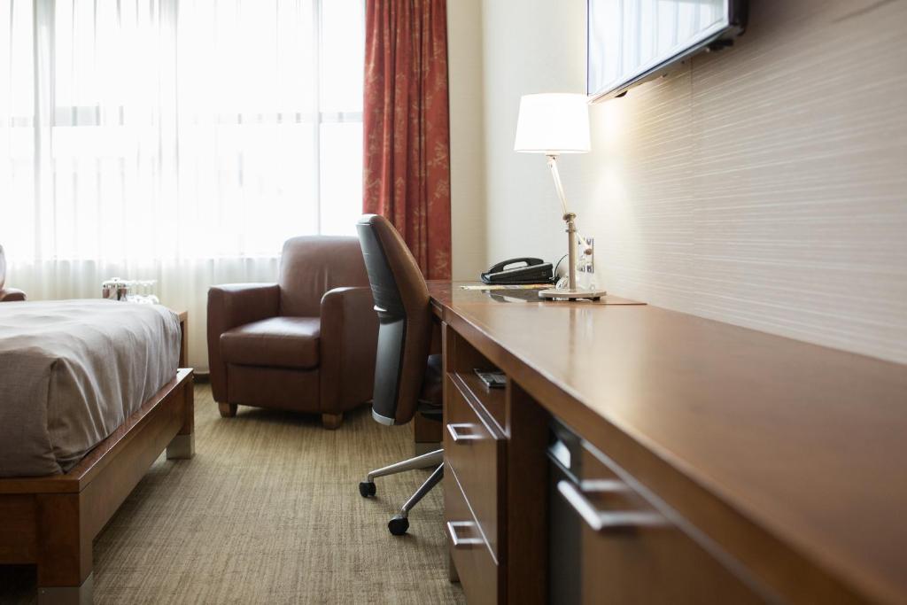 TV a/nebo společenská místnost v ubytování Hotel Chateau Laurier Québec
