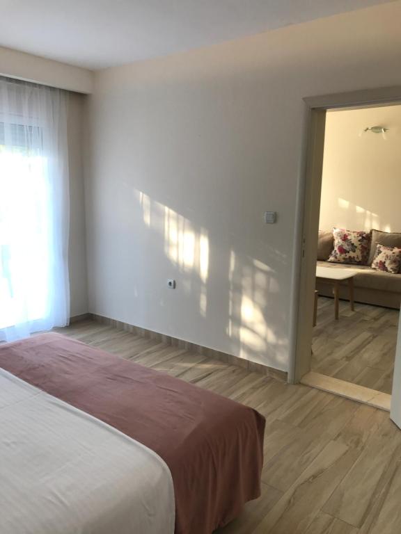 Postel nebo postele na pokoji v ubytování Apartments Ada Bojana