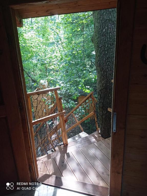 Balkón nebo terasa v ubytování Treehouse v Brdech
