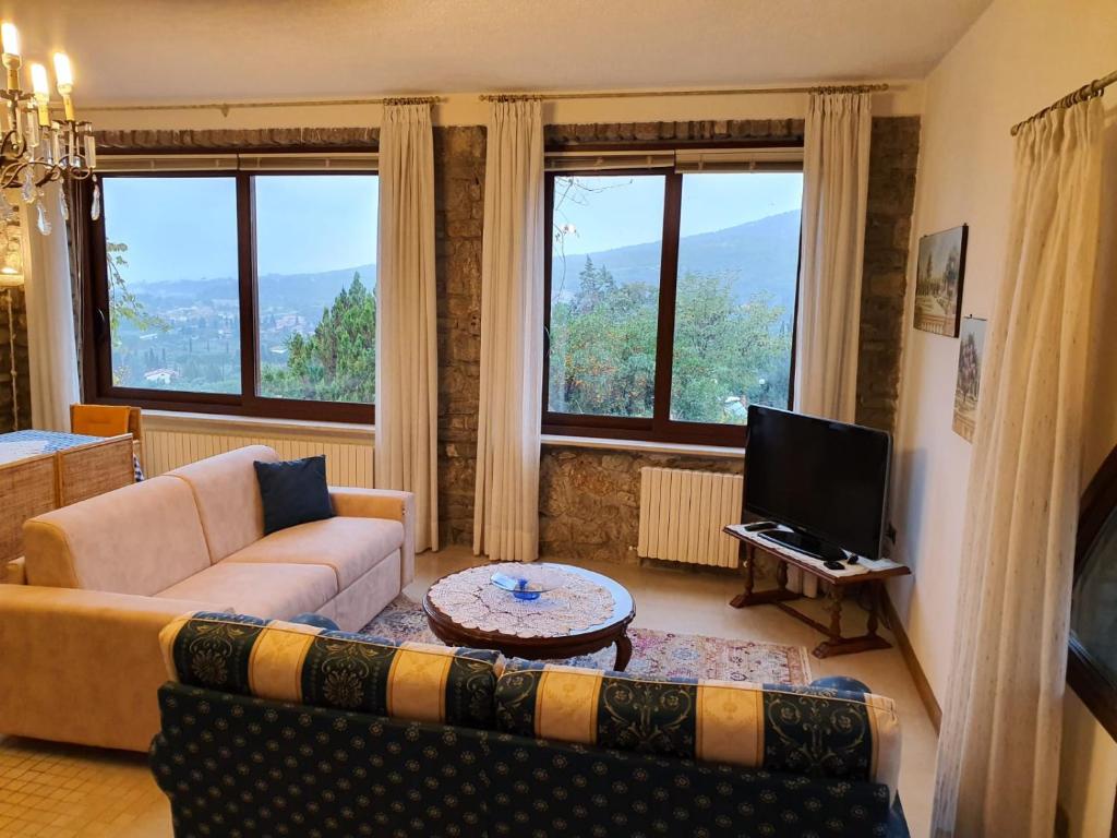 Telewizja i/lub zestaw kina domowego w obiekcie Casa Vista Lago 154 SQM