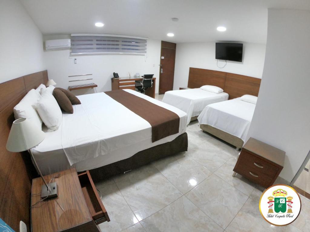 Cama o camas de una habitación en Hotel Caquetá Real HSC